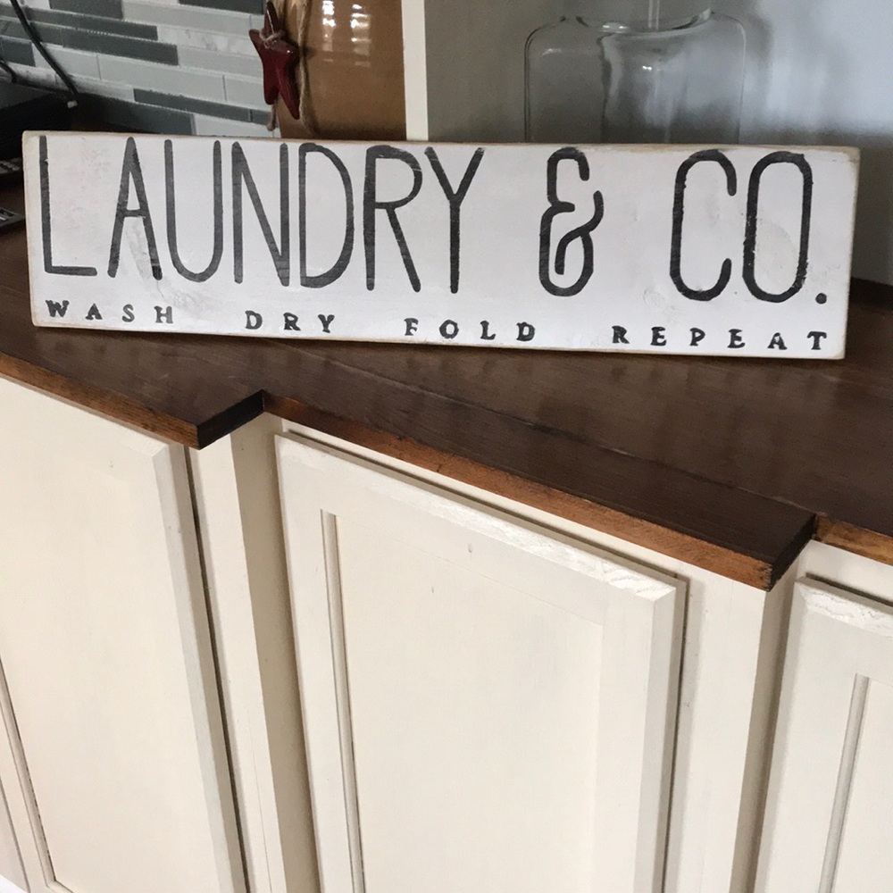 Homemade sign “ Laundry & Co.” no trim